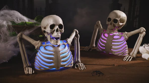 Lumex™-Glowing Skull Skeleton Decoration